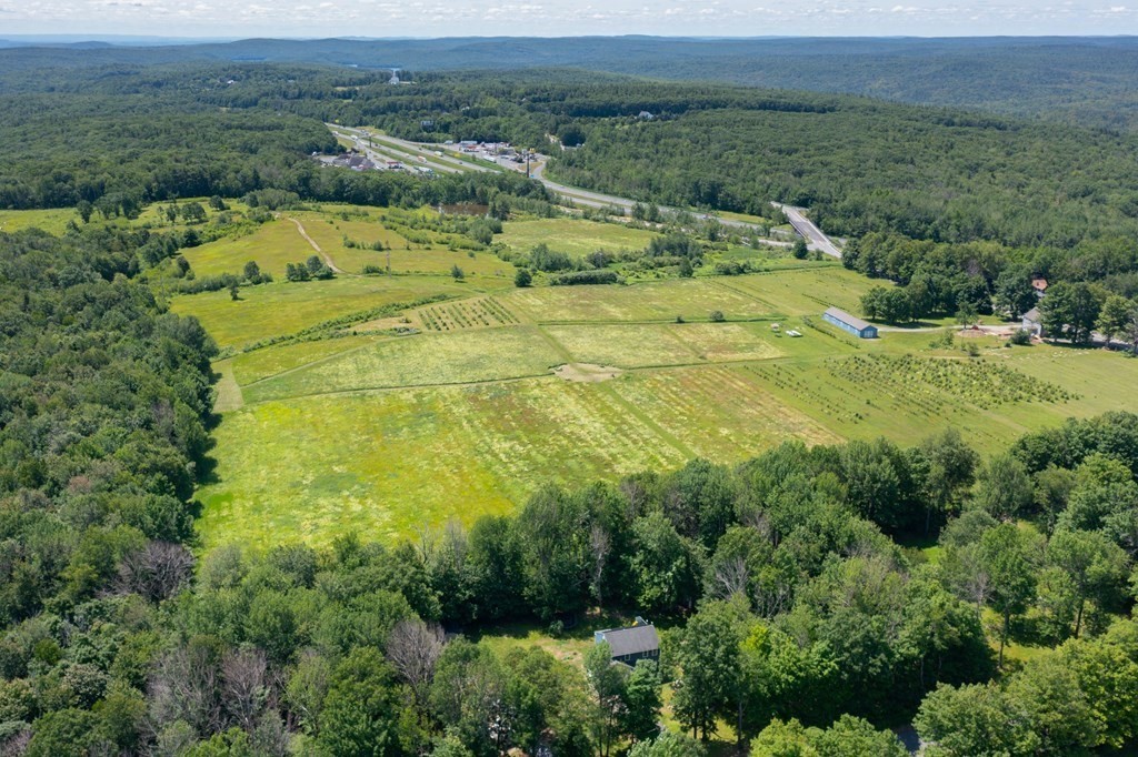 4 Huntington Road Blandford, MA 01008 - Photo 6 of 27 an aerial view of residential houses with outdoor space and trees