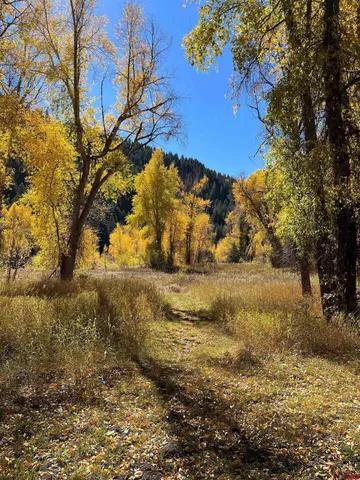 a view of a lake with mountains in the background