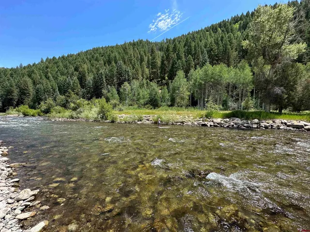 a view of a road with a yard