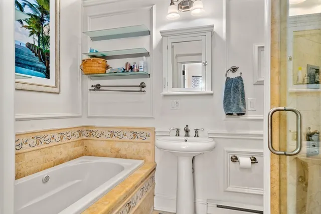 a bathroom with a sink and a bathtub