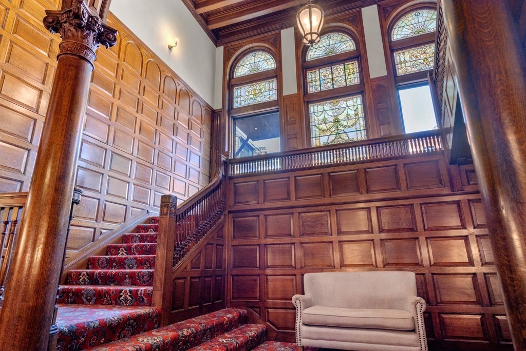 273 Commonwealth Avenue, Unit 9 Boston, MA 02116 - Photo 22 of 26 a view of staircase with large window