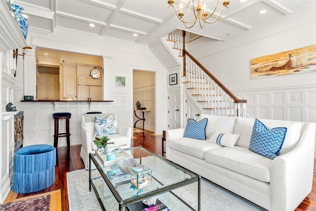 273 Commonwealth Avenue, Unit 9 Boston, MA 02116 - Photo 9 of 26 a living room with furniture and a wooden floor