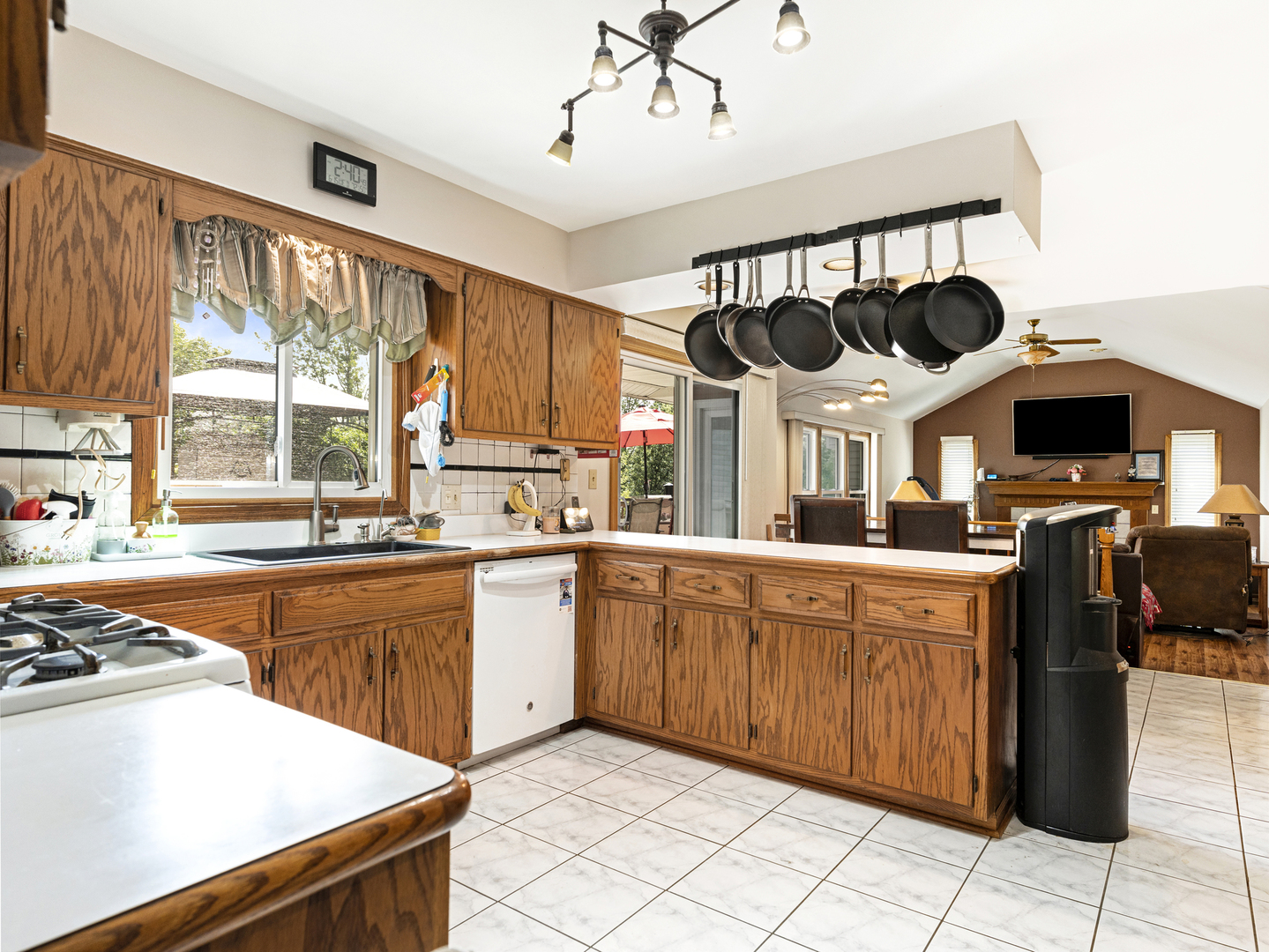 2333 Hess Drive Crest Hill, IL 60403 - Photo 12 of 26 a kitchen with stainless steel appliances granite countertop a stove and a sink