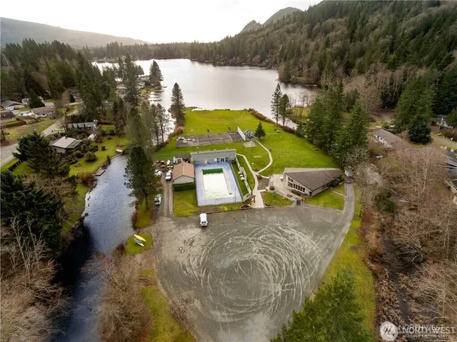 a view of a lake in a forest