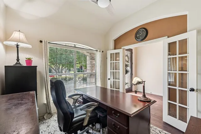 a workspace with furniture and window