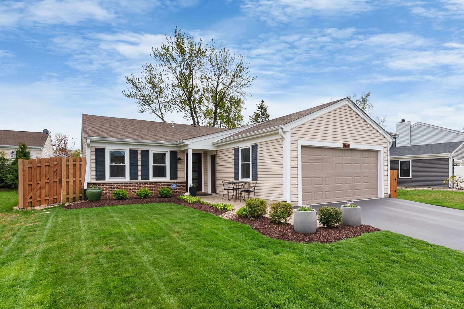 5045 Rochester Drive Hoffman Estates, IL 60010 - Photo 1 of 33 a front view of house with a garden and yard