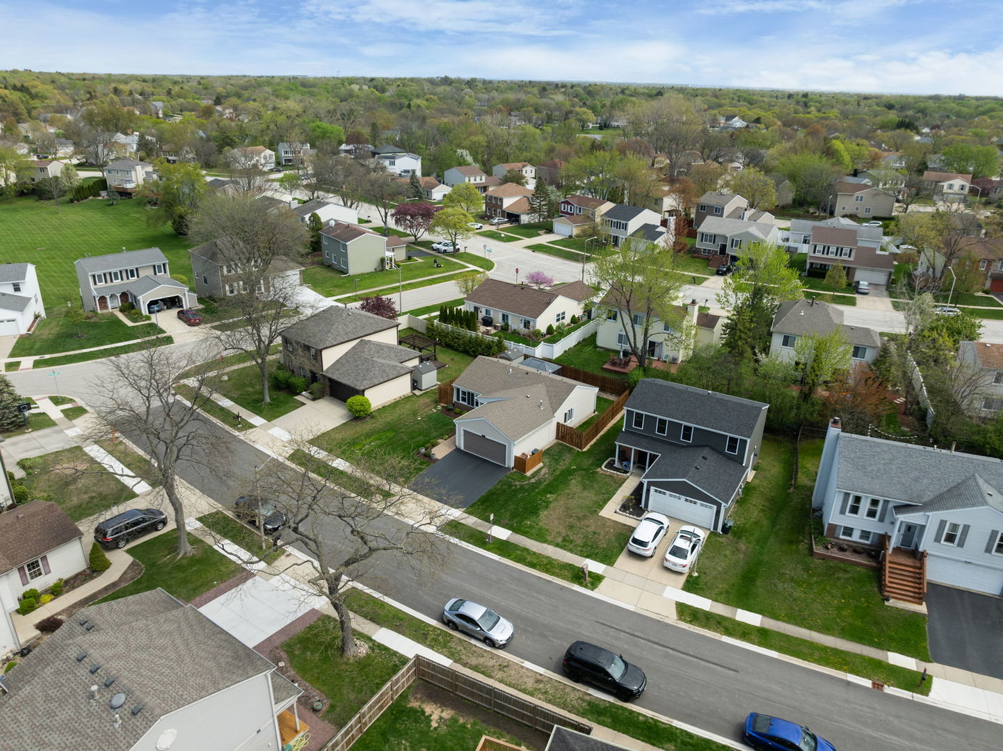 5045 Rochester Drive Hoffman Estates, IL 60010 - Photo 2 of 33 an aerial view of residential houses with outdoor space