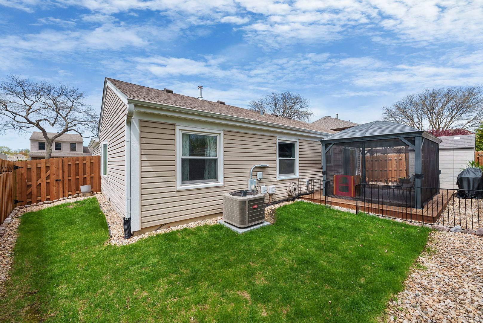 5045 Rochester Drive Hoffman Estates, IL 60010 - Photo 23 of 33 a backyard of a house with seating space