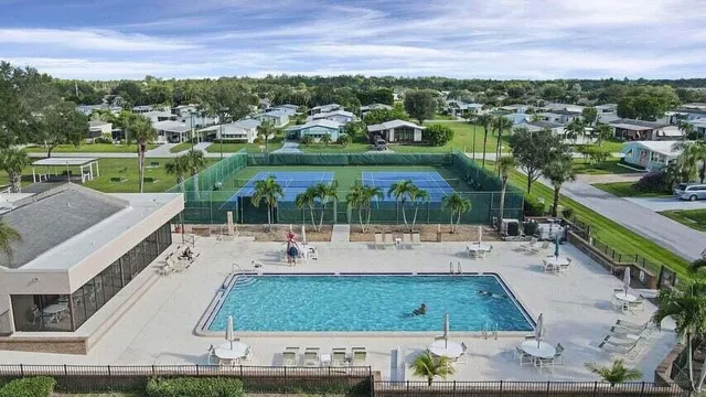 a view of an outdoor space and tennis court
