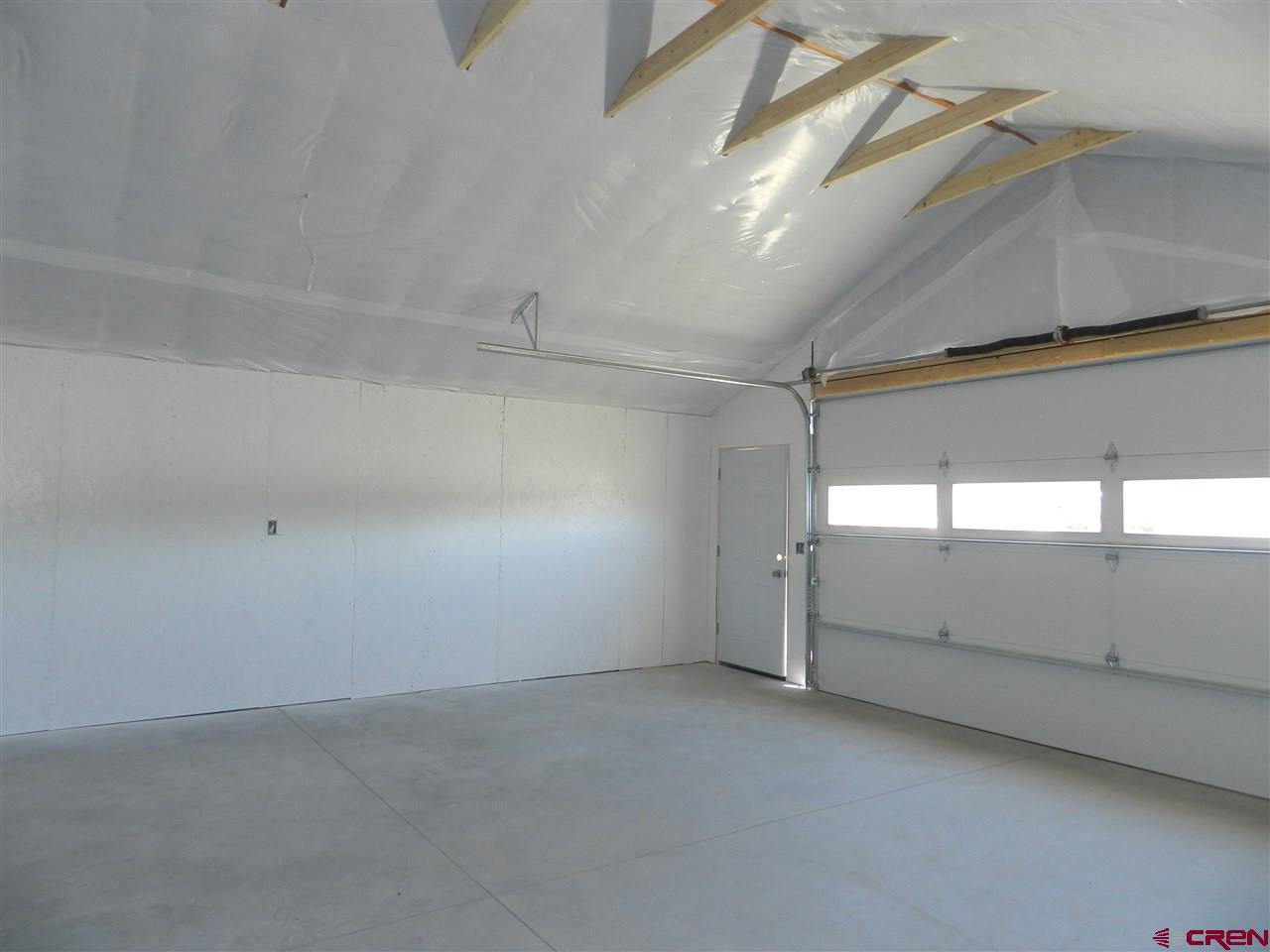 1720 6450 Road, Unit FINISHED GARAGE B Montrose, CO 81401 - Photo 8 of 8 a view of garage