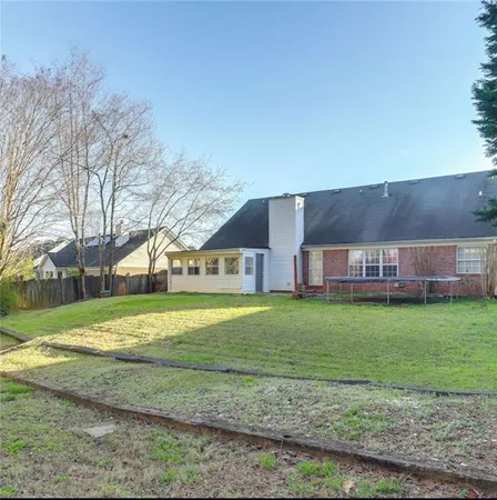 a house view with a garden space