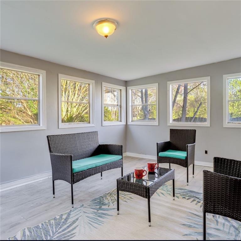 1080 Rafington Drive Lawrenceville, GA 30046 - Photo 18 of 19 a living room with furniture and a window