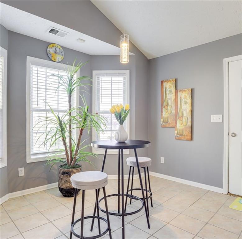 1080 Rafington Drive Lawrenceville, GA 30046 - Photo 6 of 19 a view of a dining room with furniture and window