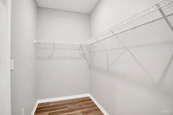 a view of a room with racks on the wall
