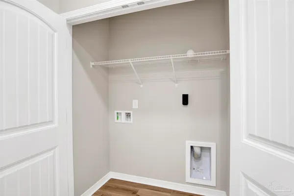 a view of small space with racks on the wall