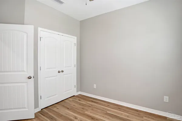 a view of small space with wooden floor