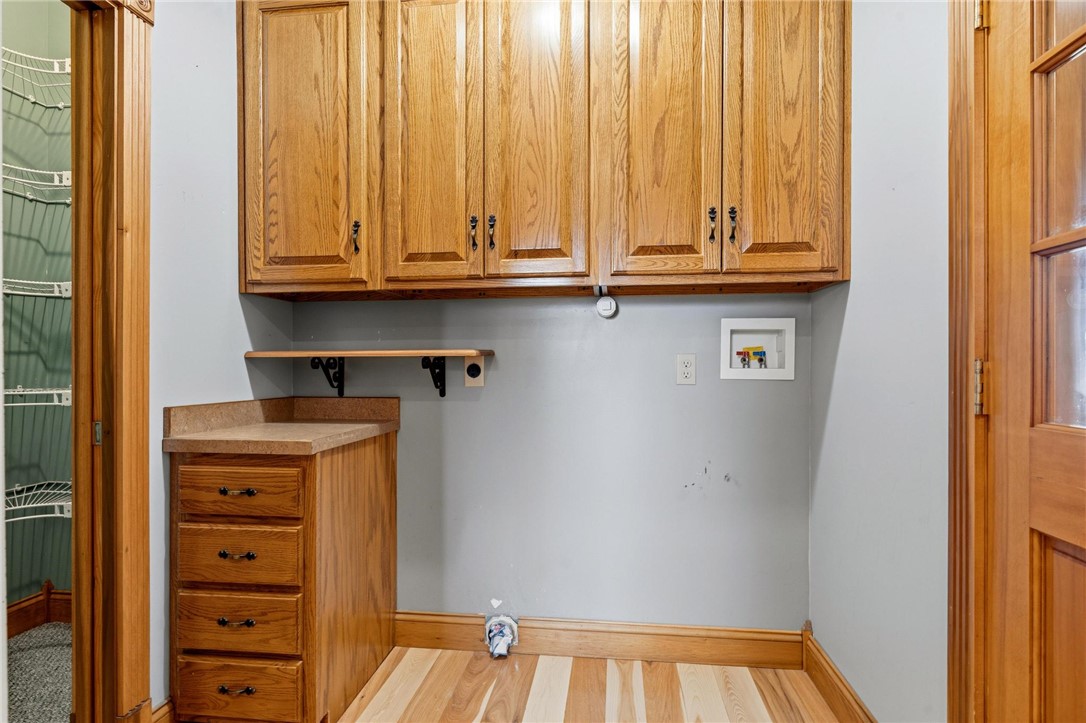 4971 Lackey Road Cedarville, OH 45314 - Photo 54 of 79 This functional space offers ample storage with warm wood cabinetry and durable flooring.