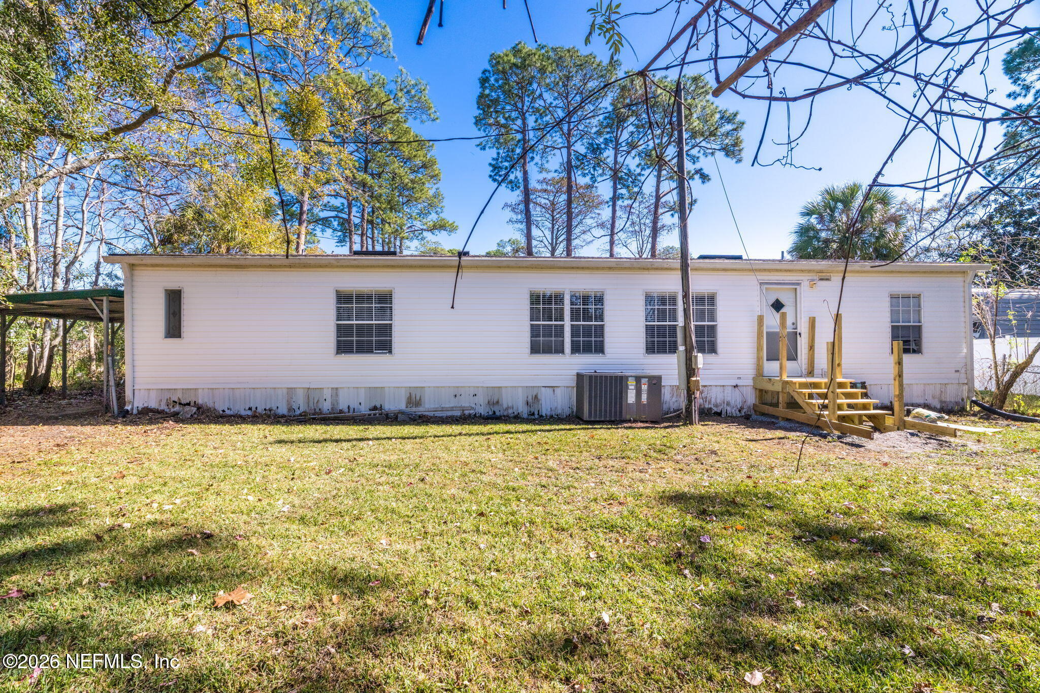 2910 Marshbank Road Jacksonville, FL 32224 - Photo 34 of 45 a view of a house with pool and sitting area