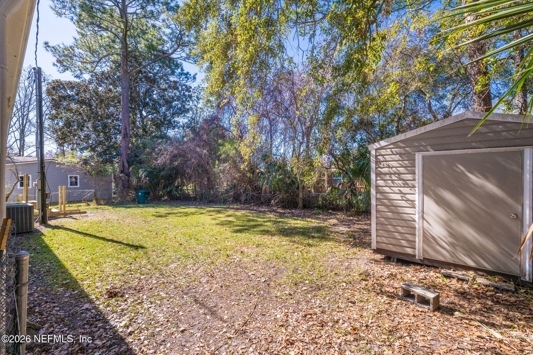 2910 Marshbank Road Jacksonville, FL 32224 - Photo 36 of 45 a view of a backyard with large tree