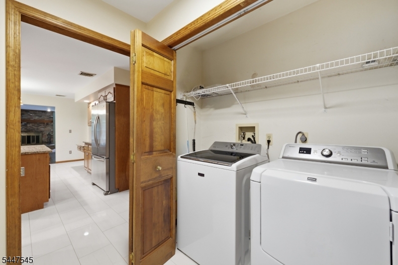 860 Glen Road Sparta, NJ 07871 - Photo 23 of 43 a utility room with dryer and washer