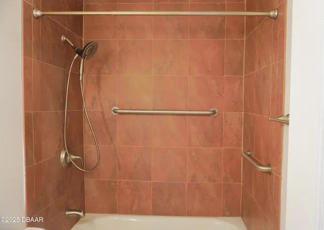 a view of a room that has a large window