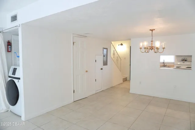 a view of a kitchen with a sink