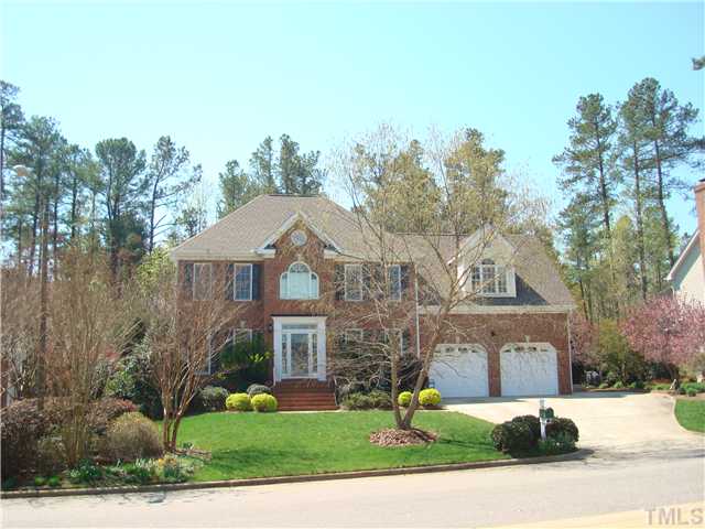 4105 Heathgate Lane Raleigh, NC 27613 - Photo 1 of 12 Front of home- gorgeous landscaping, extra parking pad, manicured to perfection!