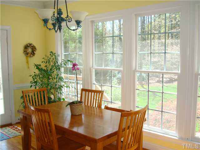 4105 Heathgate Lane Raleigh, NC 27613 - Photo 7 of 12 The breakfast room overlooks the wonderful private yard.