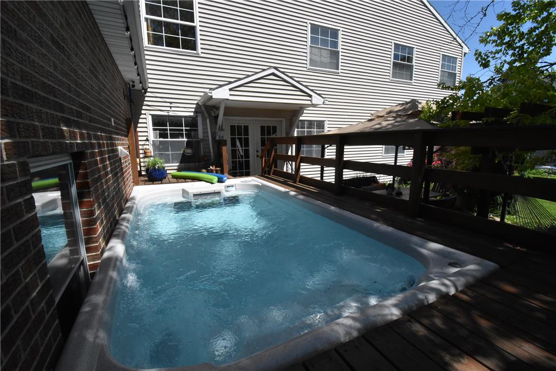 424 Grape Street Whitehall, PA 18052 - Photo 40 of 50 A secluded spa pool nestled on a wooden deck, perfect for tranquil relaxation or fitness.