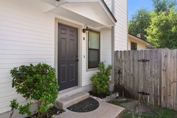 a view of a potted plants in front of door