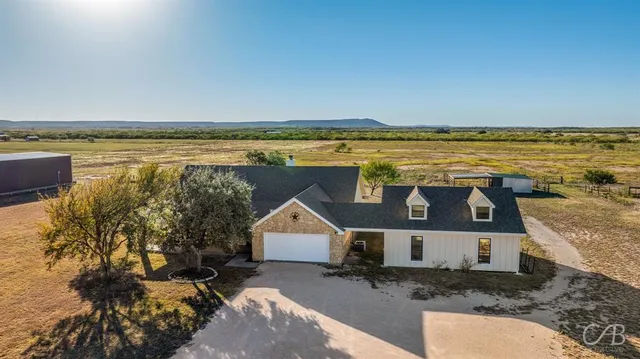 a front view of a house with ocean view