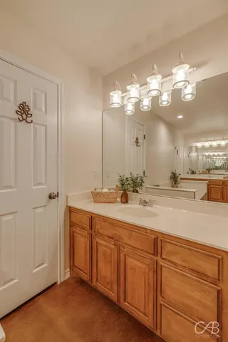 a bathroom with a bathtub and a sink