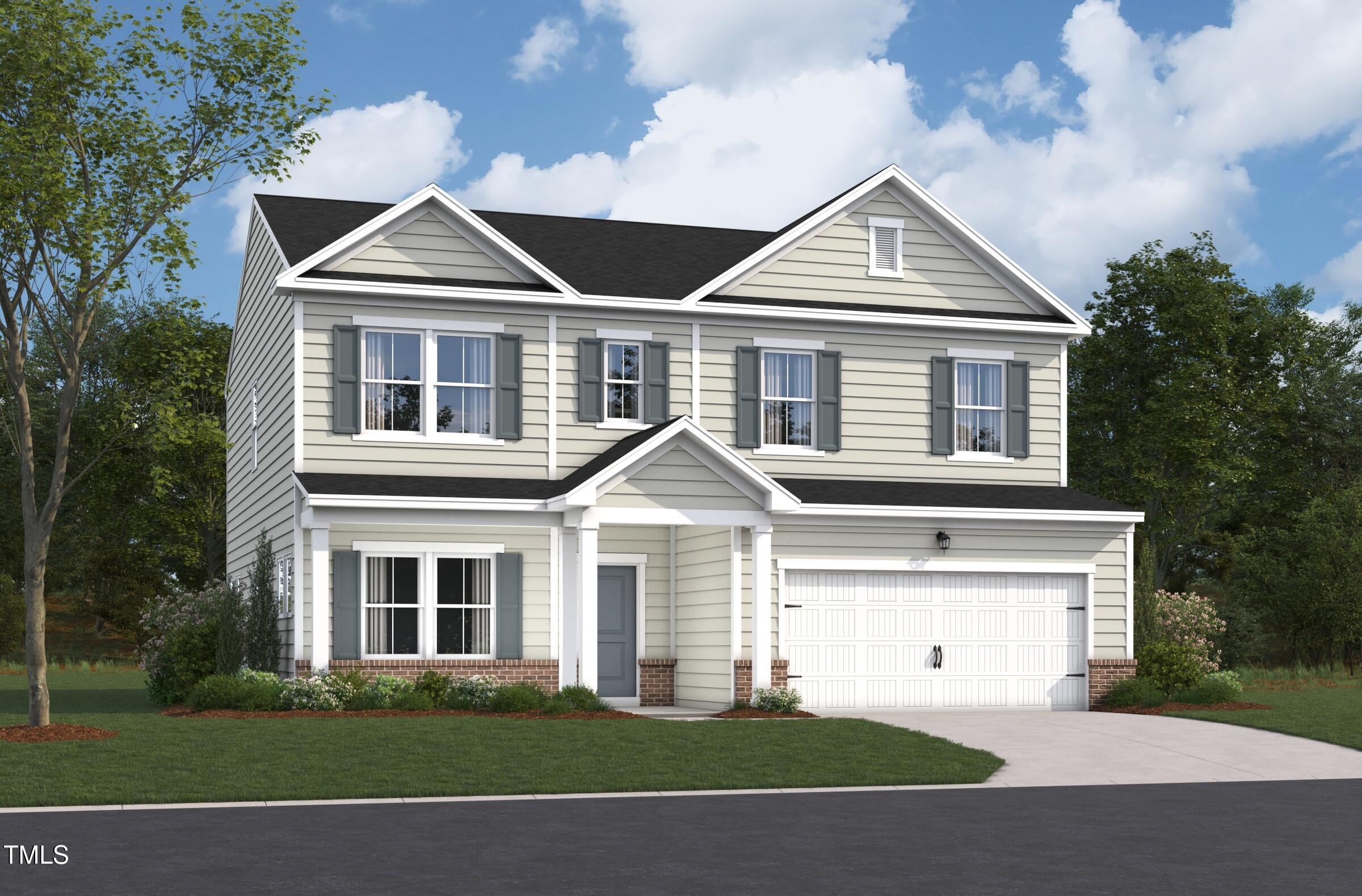 1225 Dimaggio Drive, Unit 9 Raleigh, NC 27616 - Photo 1 of 5 a front view of a house with a yard