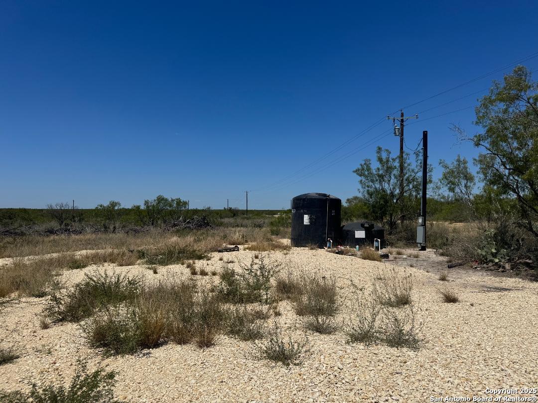 985 Franklin Rnch Road Jourdanton, TX 78026 - Photo 5 of 6 a view of a lake with a mountain