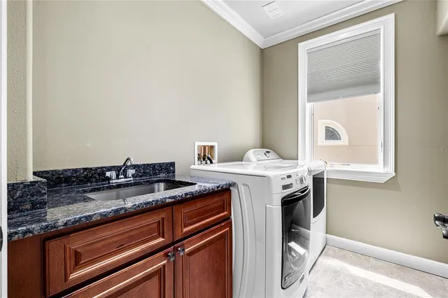 a view of a storage and utility room in a house