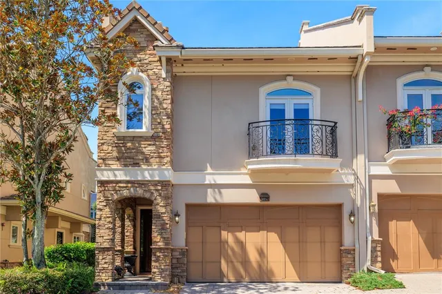 front view of a house with a small yard