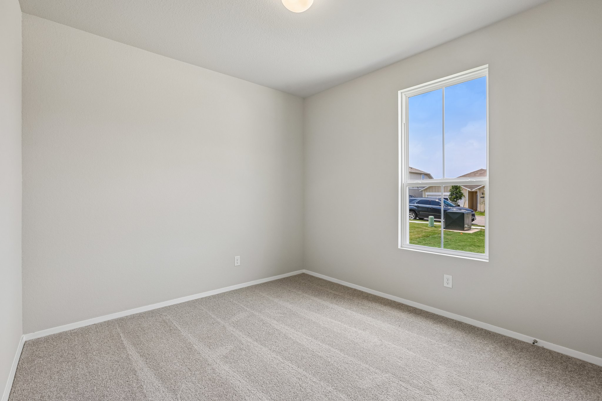 5513 Sacra Cove Austin, TX 78747 - Photo 24 of 37 an empty room with a window