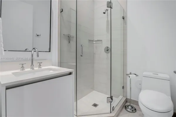 a view of a chairs and table in patio