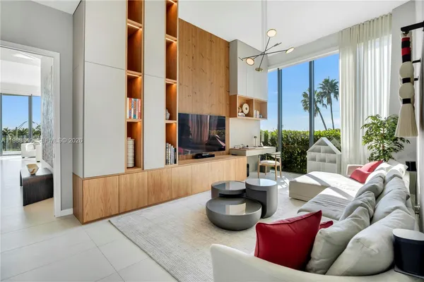 a living room with furniture and a couch