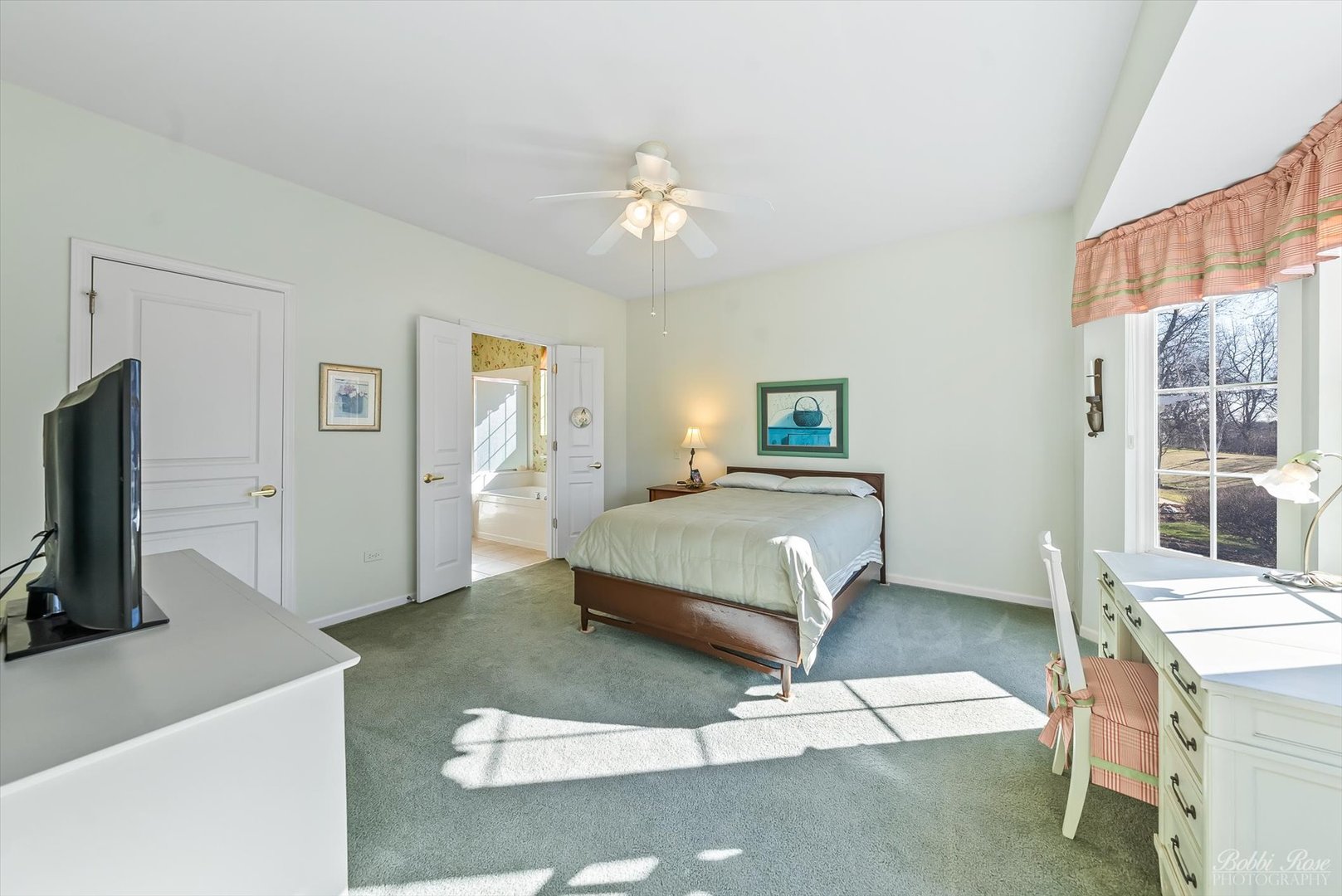 13431 Crestview Drive Huntley, IL 60142 - Photo 17 of 39 a bedroom with a bed and a flat tv screen on the dresser