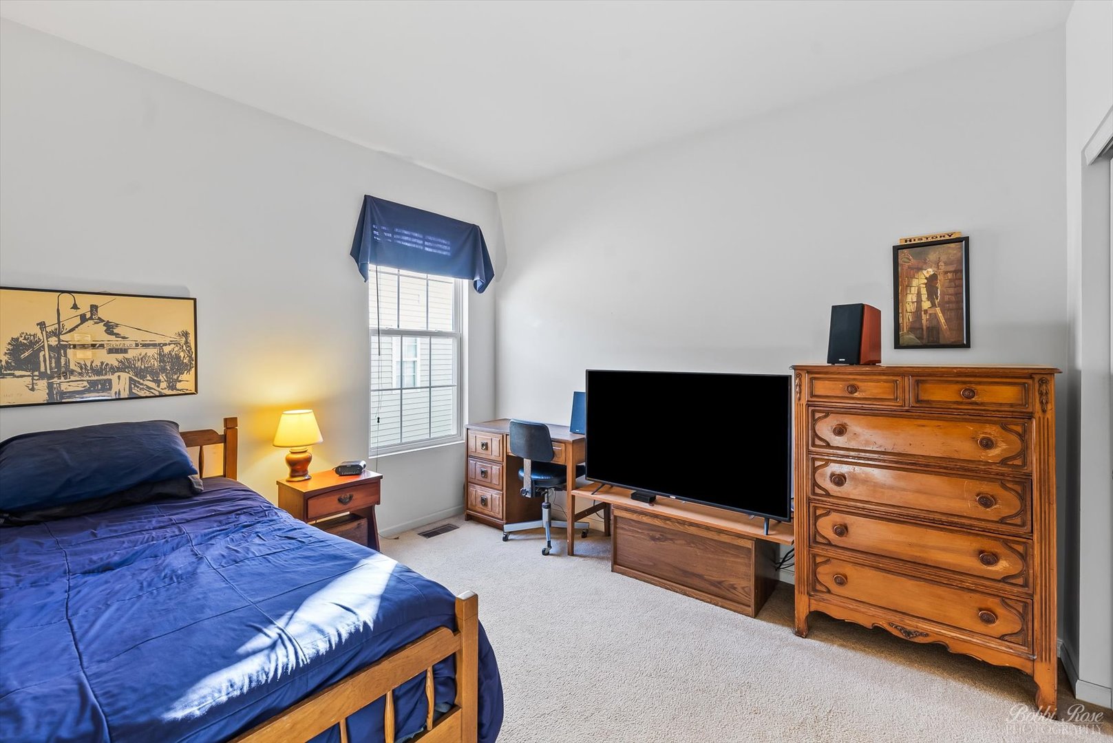 13431 Crestview Drive Huntley, IL 60142 - Photo 23 of 39 a bedroom with a bed and a flat screen tv