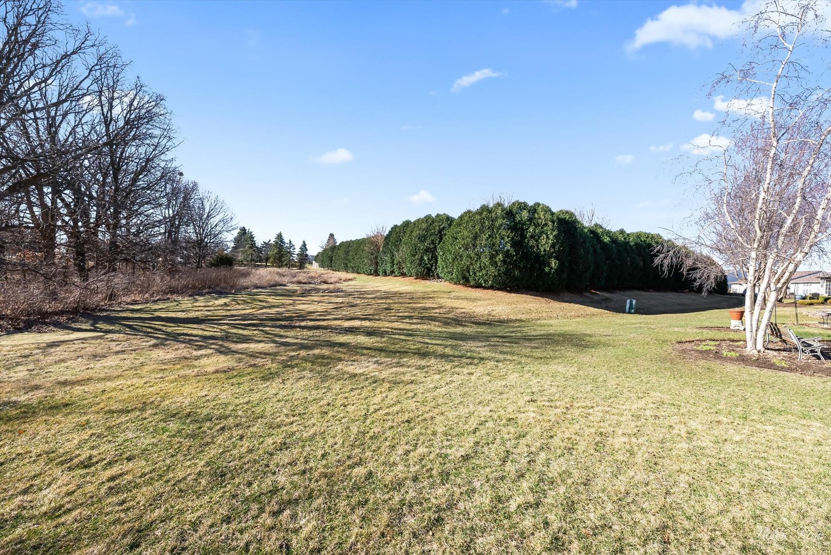 13431 Crestview Drive Huntley, IL 60142 - Photo 33 of 39 a view of a swimming pool with an outdoor space and seating area