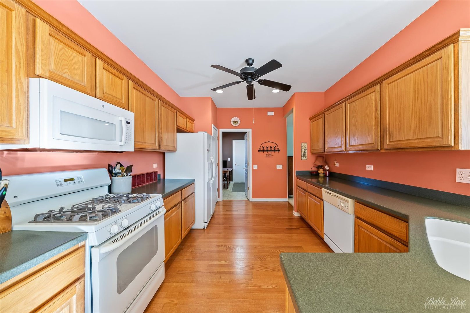 13431 Crestview Drive Huntley, IL 60142 - Photo 10 of 39 a kitchen with stainless steel appliances granite countertop a stove and a sink