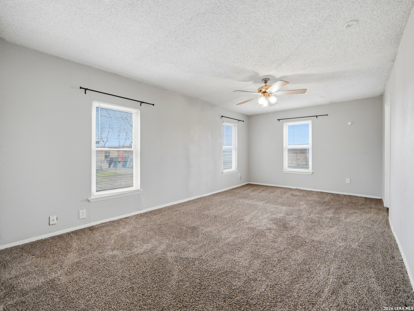 305 Toepperwein Road Converse, TX 78109 - Photo 20 of 25 a view of an empty room with a window