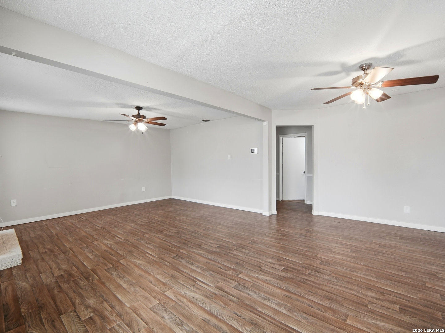 305 Toepperwein Road Converse, TX 78109 - Photo 8 of 25 a view of empty room with wooden floor