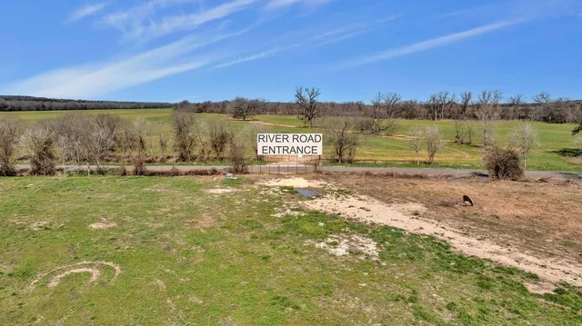 a view of a lake with a building in the background
