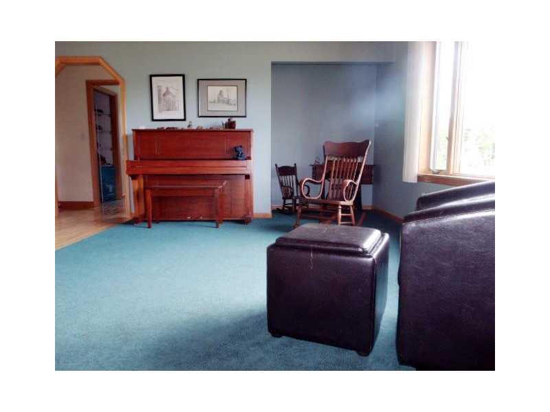 330 Holmes Road Winthrop, ME 04364 - Photo 7 of 14 Living Room. Open living room with...