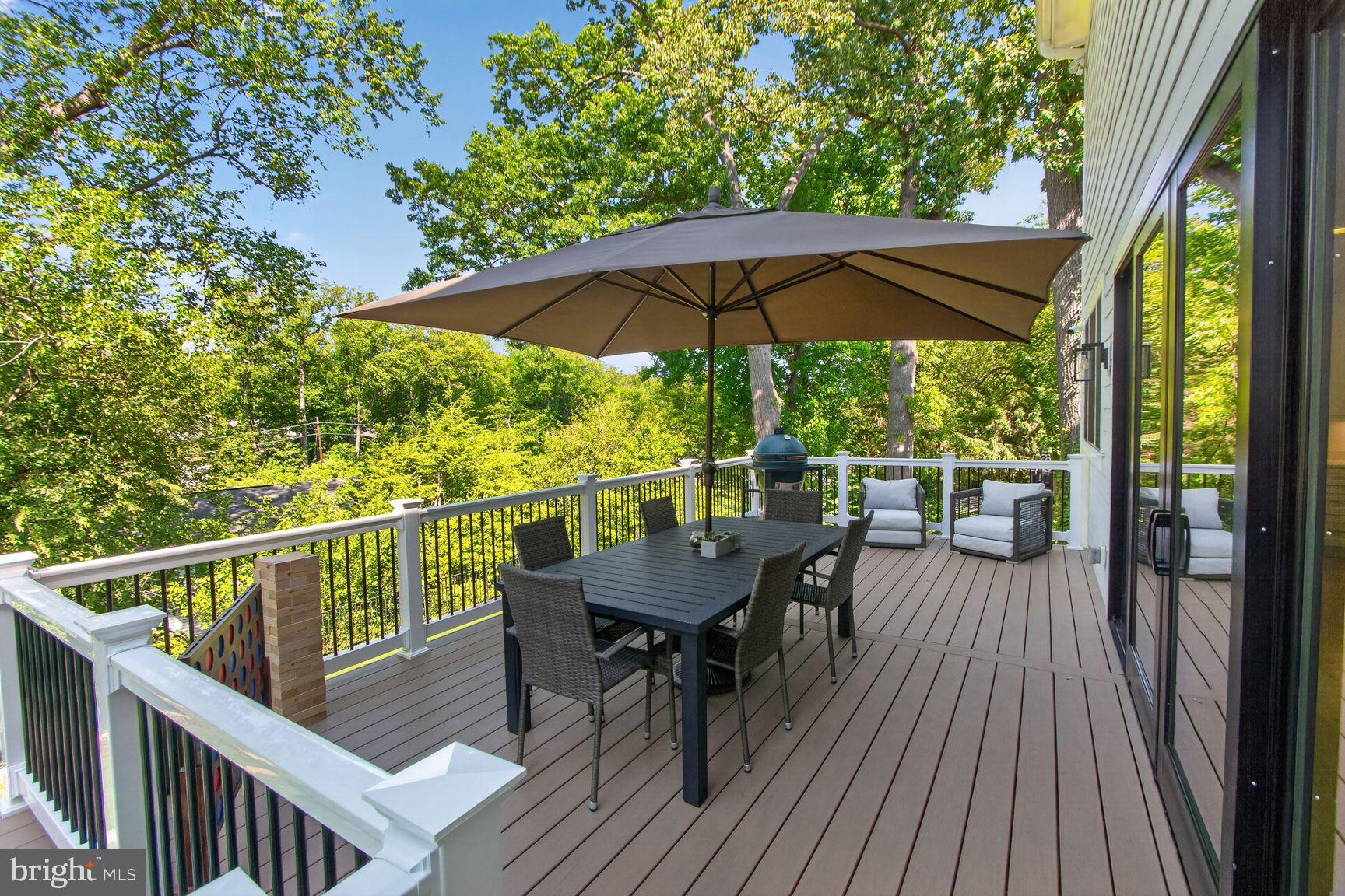 5613 Namakagan Road Bethesda, MD 20816 - Photo 22 of 58 Huge party deck directly off family room & kitchen