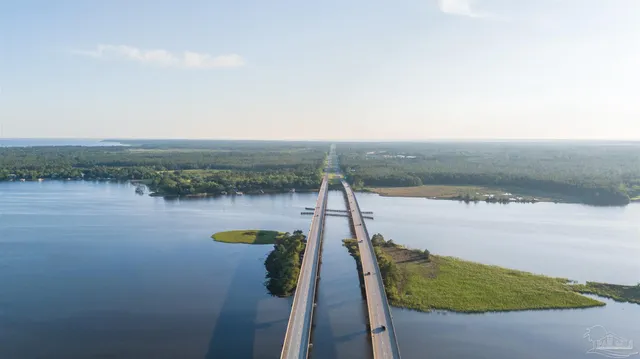 a view of a lake from a balcony