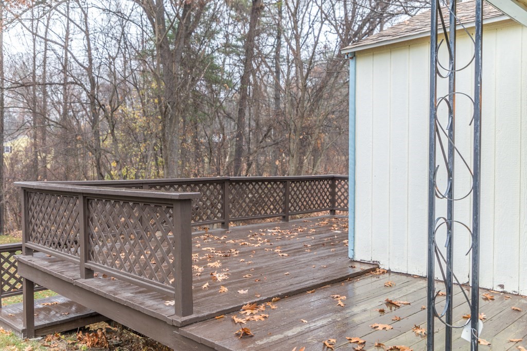 71 Whalom Road Lunenburg, MA 01462 - Photo 9 of 10 a view of a wooden fence